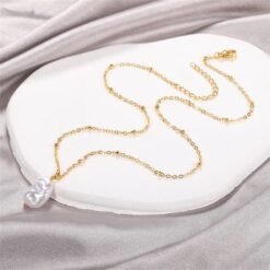 collier avec pendentif perle
