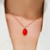 collier medaille rouge